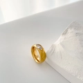 Detailed macro view of gold plated titanium steel ring with marquise cut cubic zirconia - US 6 / Gold Marquise Zirconia