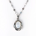 Close-up of a French vintage shell pendant with an irregular silver metal wavy frame - Irregular Oval Shell Style (Style 4 White Gold) / Silver