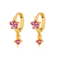 Detailed close-up of golden flower drop earrings with pink zircons on a white background - Rose Gold Red