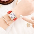 Close-up of women's square rhinestone watch with red leather strap and star bracelet - Red Watch + Bracelet