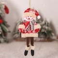Close-up of plush Christmas snowman ornament with red and beige knitted details - Snowman