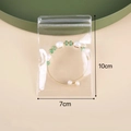 Transparent PVC jewelry pouch sized 10x7cm containing gold woven beaded bracelet - 7x10cm/26 Silk Thickness / Clear