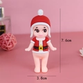 Miniature Christmas elf cake topper in red outfit with 7.6cm by 3.8cm dimensions - Red Angel Baby
