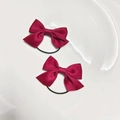 Set of two burgundy satin ribbon bow hair ties on a minimalist white ceramic plate - Hair Ties (Pair) / Burgundy