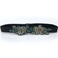 Elastic black waist belt for women featuring green beaded floral accents and crystals - Green