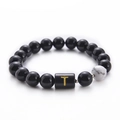 10mm black onyx bead bracelet featuring a white turquoise stone with a gold letter T - Letter T