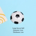 Detail view of large 3cm football resin flatback charm showing black and white patterns - 30MM Soccer
