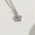 Silver elephant pendant necklace with crown design and shimmering white zircon accents - Elephant Head / Platinum Color