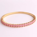 Detail view of gold-plated bracelet with square-cut pink zircon stones in a claw setting - Pink Zircon