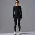 Close-up of black two-piece yoga set with long sleeve top and high-waist sports leggings - S / Black