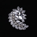 Silver swirl alloy brooch with pear-cut crystal and sparkling rhinestone accents - MM-BR-0034 / Silver