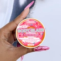 Handheld 57g Body Glaze moisturizer with donut scent in a pink jar for glowing soft skin - Donut / Small