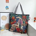 Artistic knit jacquard tote bag featuring colorful botanical female portrait and striped straps - Style 2 (Woman among Flowers and Leaves)