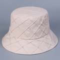 Detail of off-white quilted bucket hat showing the diamond stitching and cotton texture - M(56-58cm) / Beige