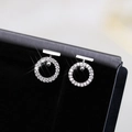 Elegant S925 silver stud earrings with circular micro-pave white cubic zirconia stones - White Gold