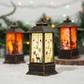 Detail view of a vintage Christmas lantern with reindeer print and warm LED light effect - Starry Small Reindeer / Gold