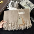 Elegant beige cashmere-feel scarf with long tassels and premium brand tags shown in flat lay - 200x68cm / Oatmeal