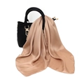 Detail of champagne gold silk scarf draped on a black handbag showing smooth texture - One Size / Faux Silk Satin / Champagne Gold