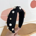 Detail of black fabric headband featuring faux pearls and sparkling rhinestones - Black