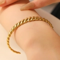 Polished gold-finished twisted rope cuff bangle for women with an open design - Twisted Rope Spiral (0175)