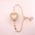 Montre élégante en forme de cœur or rose avec strass et bracelet perles ajustable - Or rose