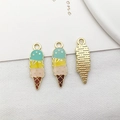 Three ice cream charms in blue, yellow and pink enamel with golden metal finish - Multicolor Ice Cream
