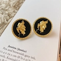 Vintage black enamel earrings with golden relief portraits in an ornate woven frame - Classical Justitia Portrait Stud Earrings