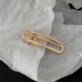 Elegant gold metal hollow oval hair clip with duckbill spring design on white paper - Gold Hollow Oval Style B