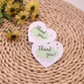 White heart-shaped thank you card with green watercolor and orange heart design - Heart Tag No. 6