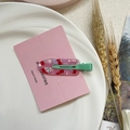 Pink checkered hair clip with cherry pattern and green metal clip on display card - Summer Cherry