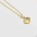 Minimalist gold necklace featuring a square textured pendant with a central cutout - Letter O