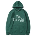 Dark green oversized hoodie featuring Yes I'm Cold 24:7 white text print with pouch pocket - S / Hooded / Dark Green