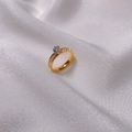 Golden ring with round blue gemstone and pavé diamonds on white silk background - Size 6 / Ring / Gold