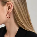 Close-up of a 3cm red twisted hoop earring worn by a model in Chinese style - 31# Silver Post - Red 4.2cm