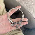 Bracelet à breloques argenté avec pendentif cœur et main de Fatma en acier inoxydable - Bracelet Légende Interstellaire