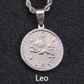 Silver Leo zodiac coin pendant necklace with embossed lion and rope chain details - Leo / Steel