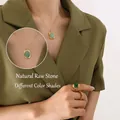 Vintage gold titanium steel necklace and rings set with natural green stone on a model - Gold Natural Green Stone