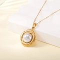 Gold stainless steel necklace with round textured frame and white inlaid pearl - Textured Round Large Pearl Style (137613)