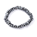 Macro detail of irregular smooth hematite stones on a handcrafted stretch bracelet - Hematite