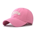 Close-up of pink cotton baseball cap featuring white 3D embroidered Nothing lettering - Pink