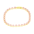 Detailed macro shot of 18k gold-plated tennis bracelet with pink square-cut zircons - Pink