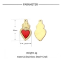 Detailed view of 22x12mm gold stainless steel heart pendant with red inlay and flame top - VG599 Gold Red Enamel Crown Heart Pendant