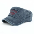 Detail of washed navy military cap featuring red survivor embroidery and frayed edges - Navy Blue