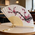 Traditional Chinese folding fan with pink plum blossom painting and bamboo ribs - Style 56 (New Style)