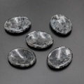 Oval natural stone thumb scrapers in gray and black marble finish for facial massage - Black Flash Stone (1pc)