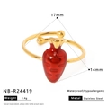 Macro view of gold stainless steel ring featuring a vibrant red enamel carrot design - Carrot Style (NB-R24419)