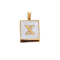 Macro detail of square stainless steel gold pendant with white shell inlay and letter X - Gold X