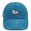 Detailed embroidery of a cute cartoon seal on a navy blue washed cotton baseball cap - Lake Blue