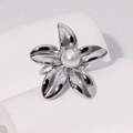 Minimalist silver stainless steel flower ring with white pearl on a white pedestal - Silver Open Flower Pearl Style / Steel