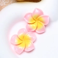 Close-up of pink and yellow gradient resin plumeria flowers for DIY crafts decoration - Large Light Pink